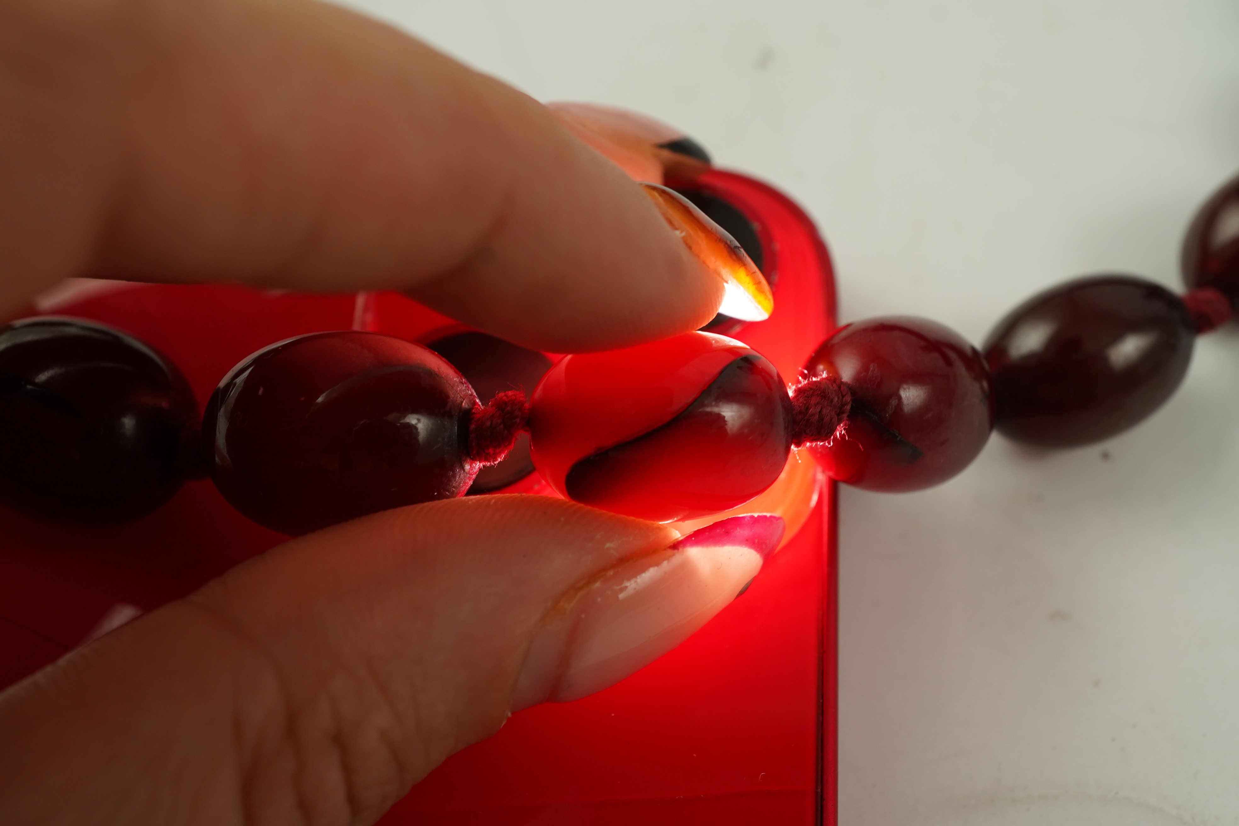 A cherry bakelite 'amber' necklace